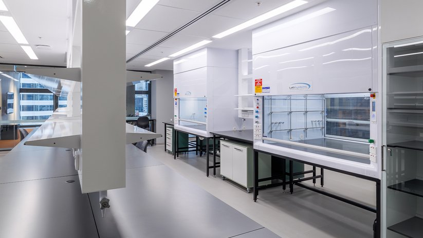 Open laboratory at ACMD with benches, fume hoods and bright interior.