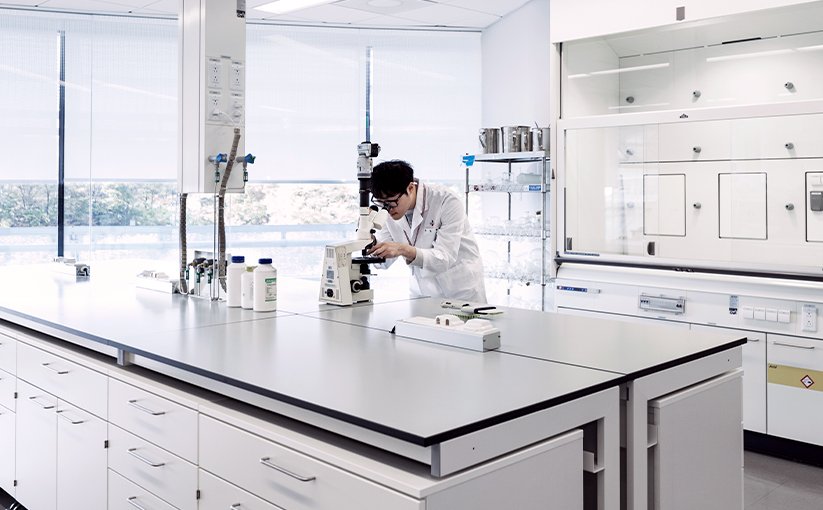 Modern laboratory with researcher at laboratory benches