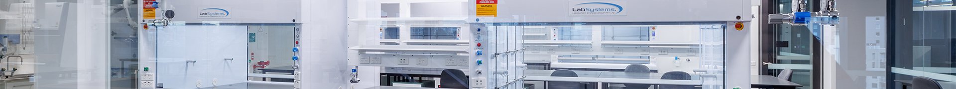 Laboratory workspace with integrated fume cupboards