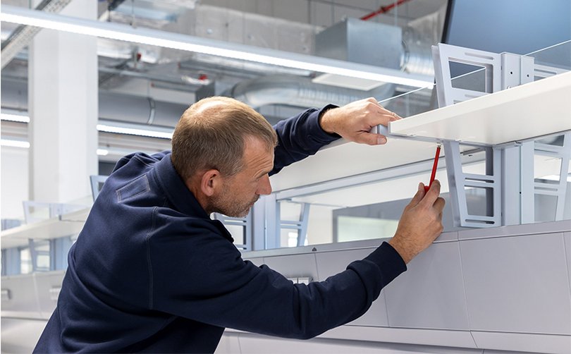 Technician sets up laboratory