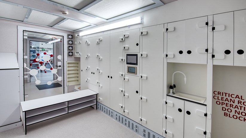 Technical lab wall at the University of Otago with integrated services and storage.