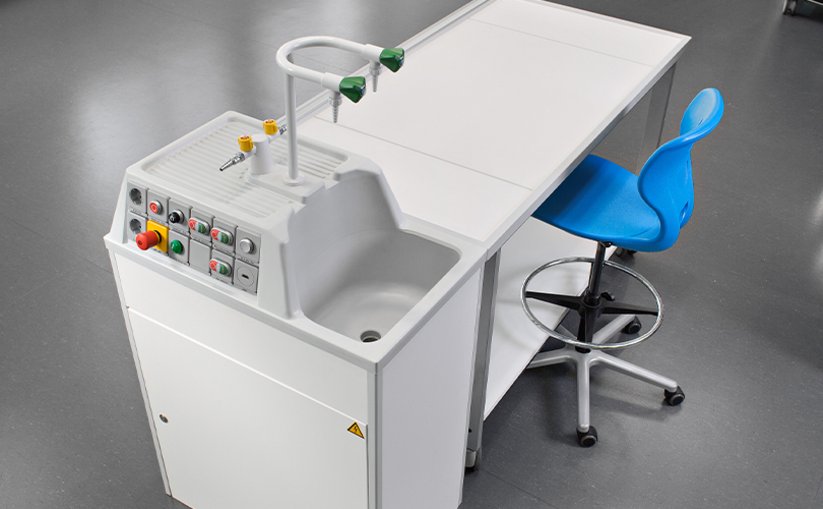 Laboratory workstation with integrated sink, gas supply and control elements