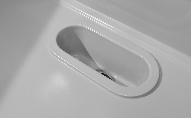 a small drip cup that functions as a laboratory sink