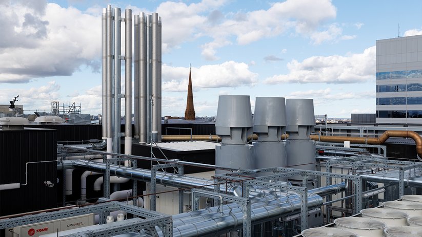 Rooftop plant area at ACMD with building services and city view.