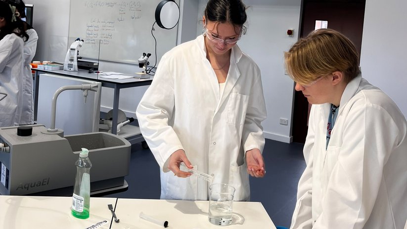 Two students experimenting