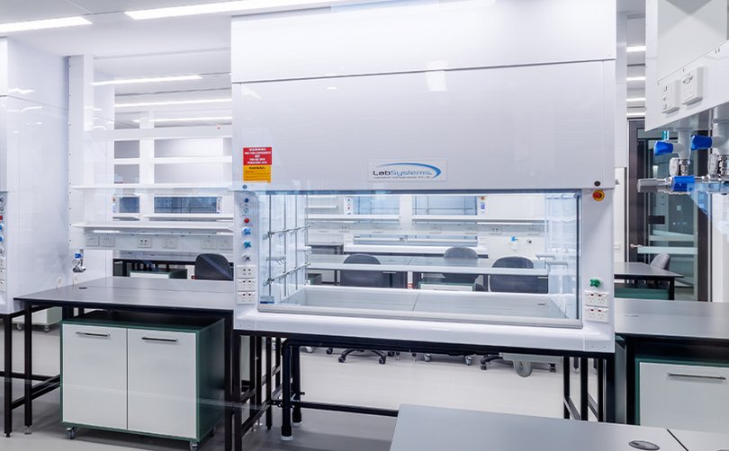 Laboratory workspace with integrated fume cupboards