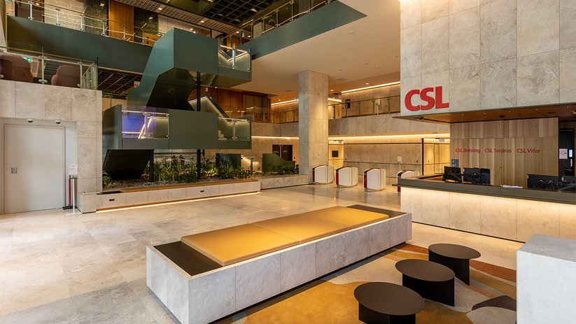 Reception area at CSL Melbourne with seating and open interior design.
