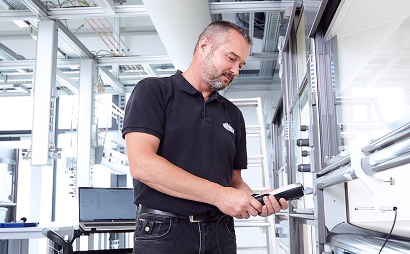 Employee checks a system