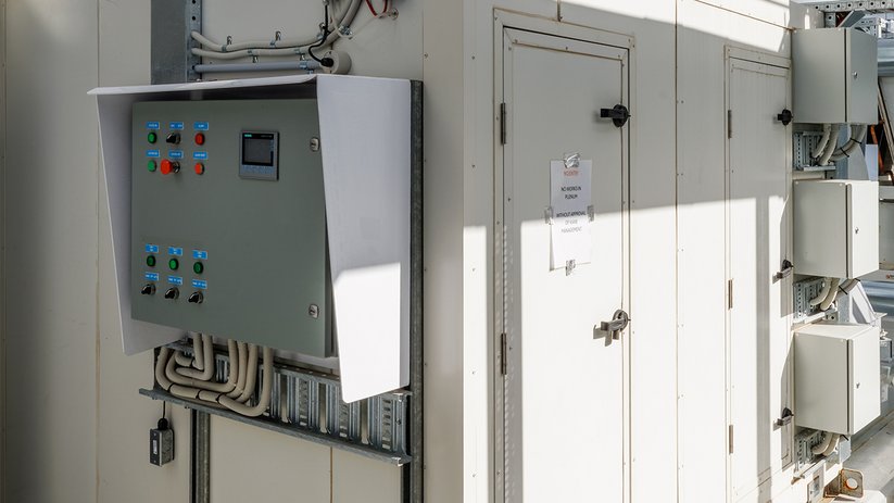 Technical service area at ACMD with control panel and utility cabinets.