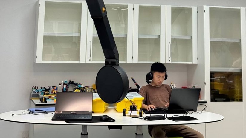 Students at a desk with a Fly One®