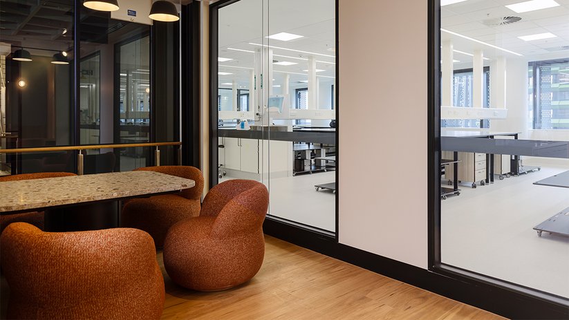 Lounge area at CSL Melbourne overlooking the laboratory.