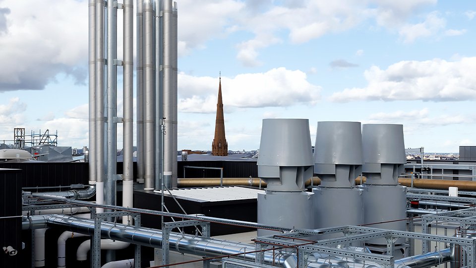 Industrial rooftop ventilation system with large exhaust fans